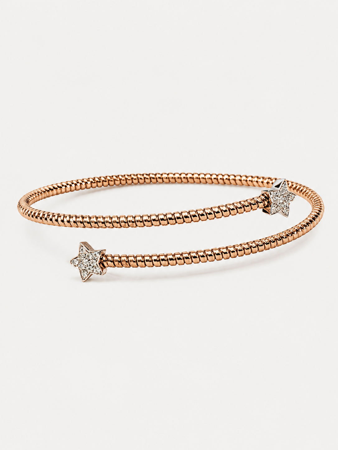Bracciale Aperto in Oro Rosa e Bianco con Stelle e Diamanti