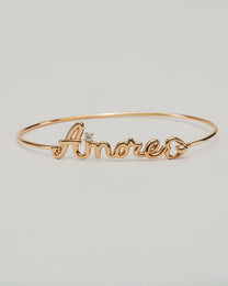 Bracciale Rigido Dorato Amore con Punto Luce