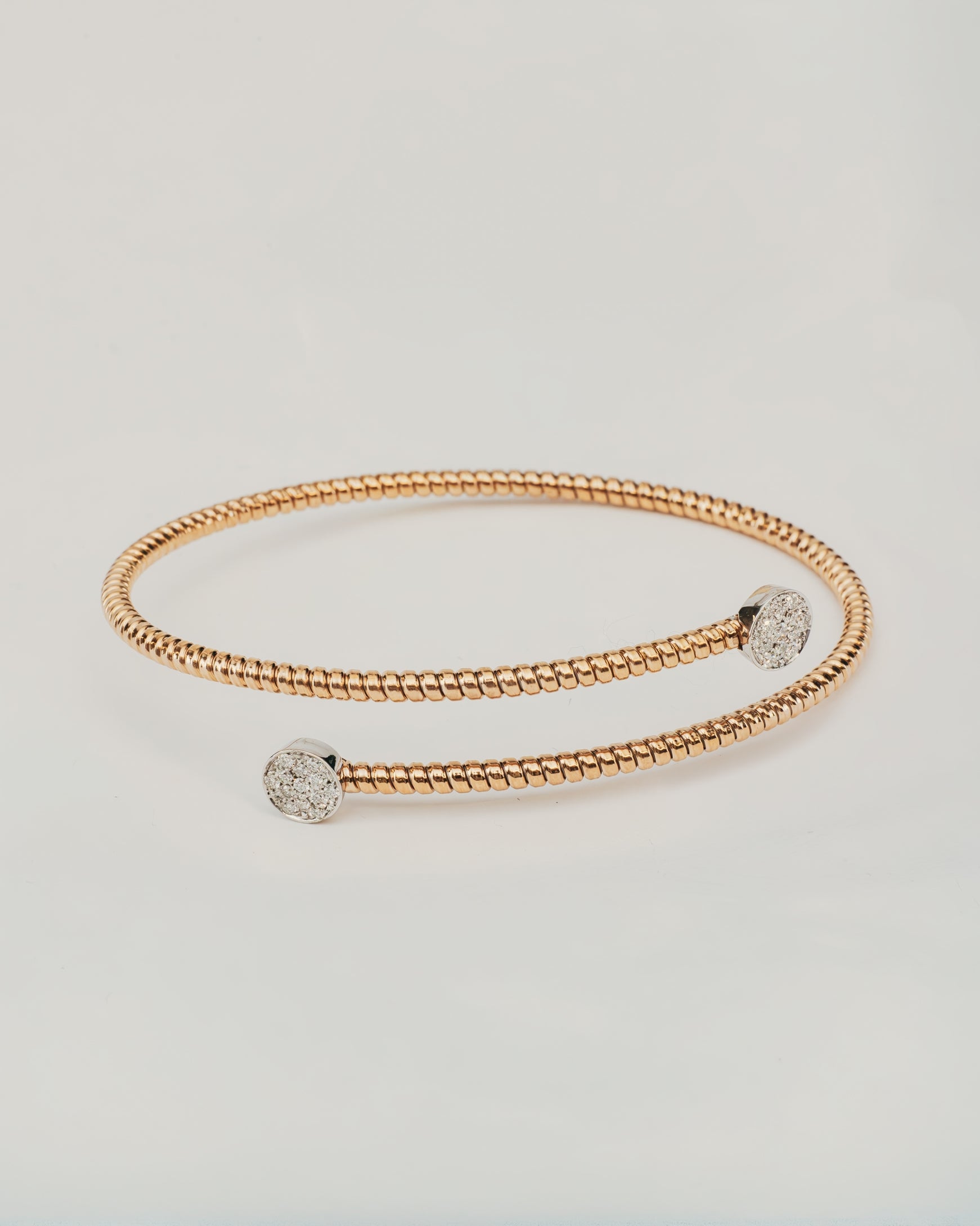 Bracciale Rigido Dorato con Terminali Punto Luce
