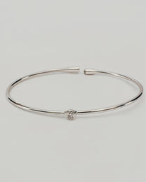 Bracciale Rigido Argentato con Punto Luce Centrale