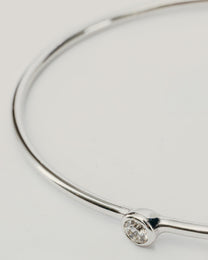 Bracciale Rigido Argentato con Punto Luce Centrale