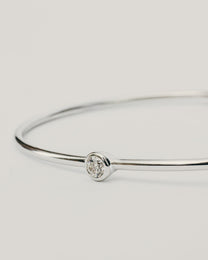 Bracciale Rigido Argentato con Punto Luce Centrale