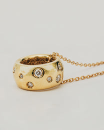 Collana Dorata con Pendente Cilindrico e Diamanti