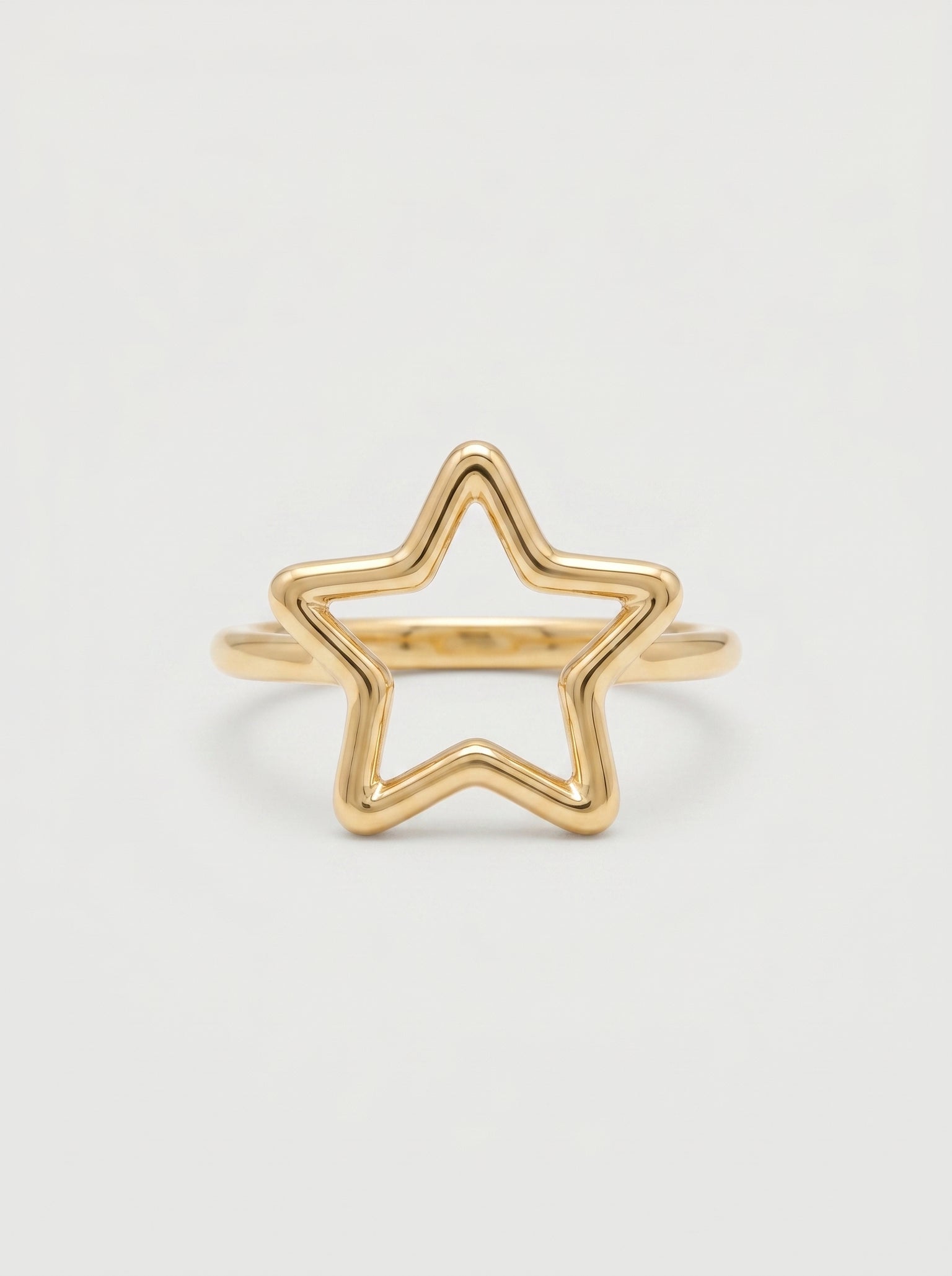 Anello stella traforata in oro giallo 18 kt