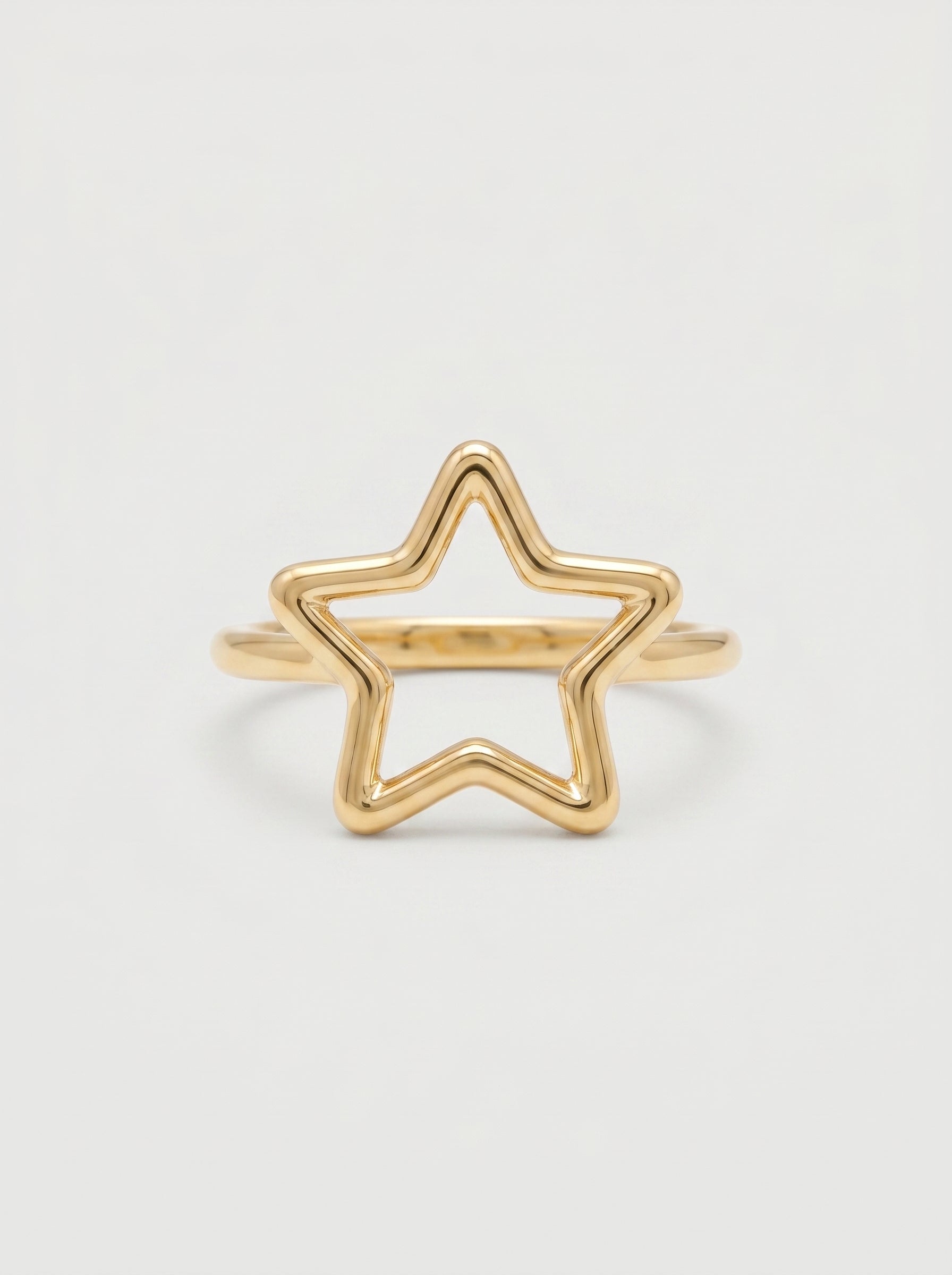 Anello stella traforata in oro giallo 18 kt