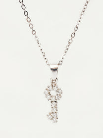 Collana con chiave in oro bianco e diamanti
