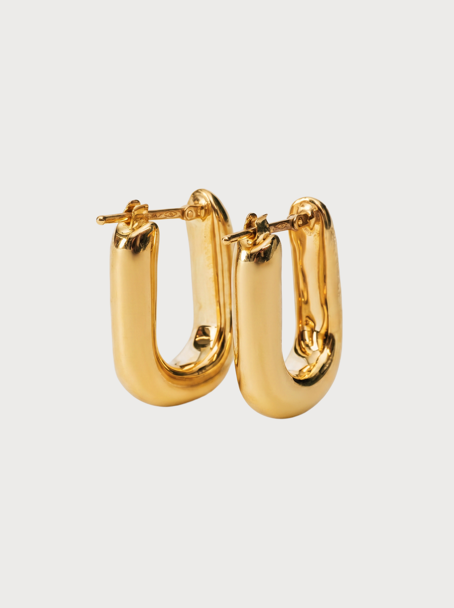Orecchini a cerchio ovali in oro giallo 18 kt